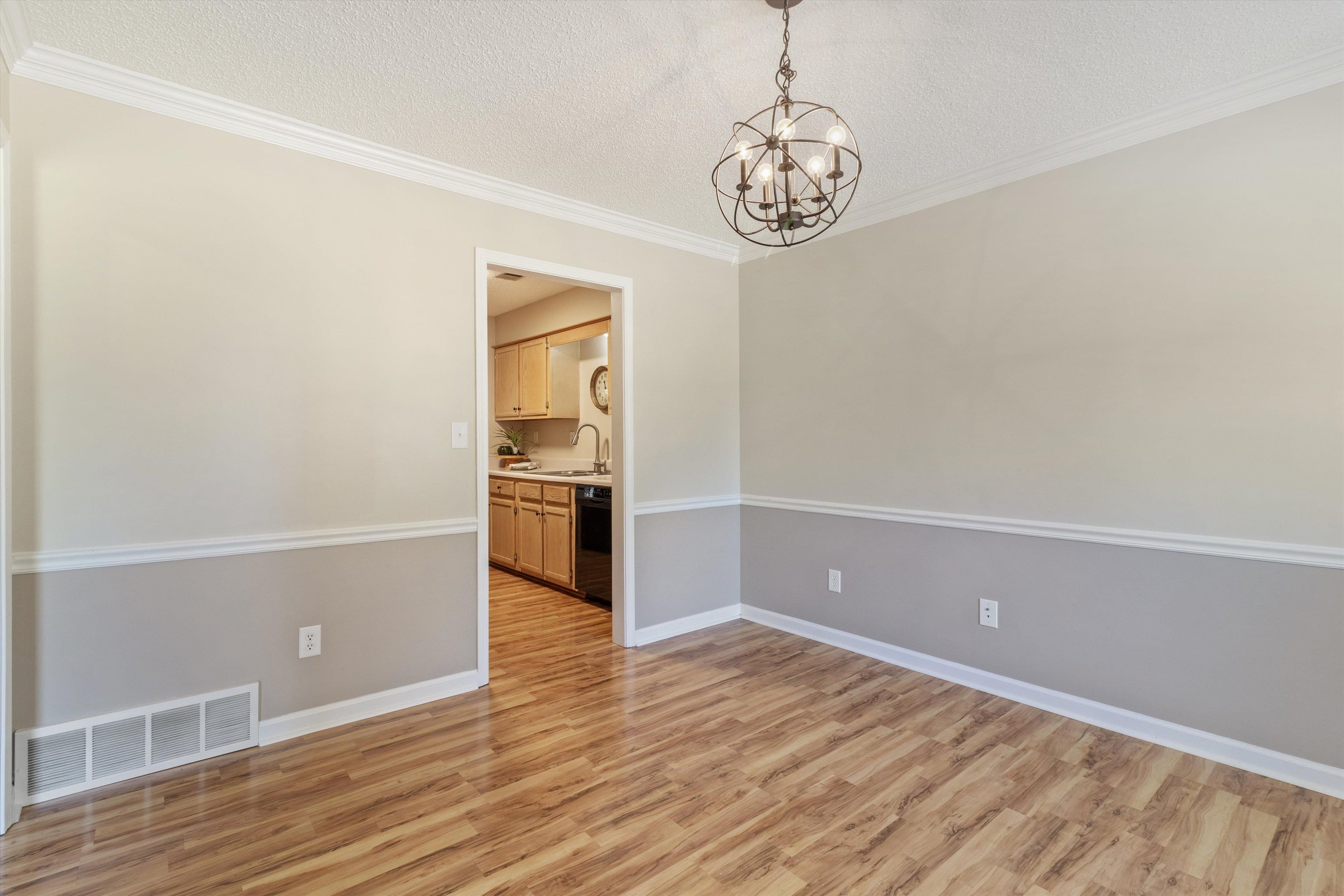 465 Harts Way Drive Collierville, TN 38017 - Photo 7 of 29 a view of a kitchen with a dishwasher cabinets and wooden floor