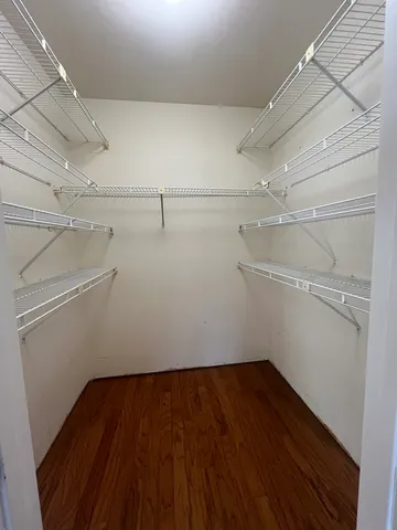 a view of a room with racks on the wall