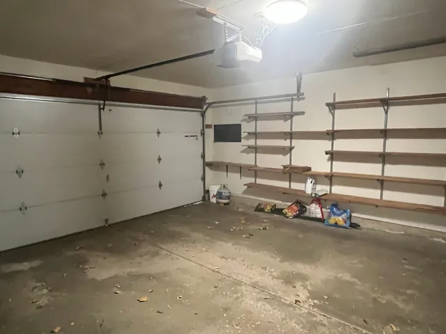 a view of a garage with storage