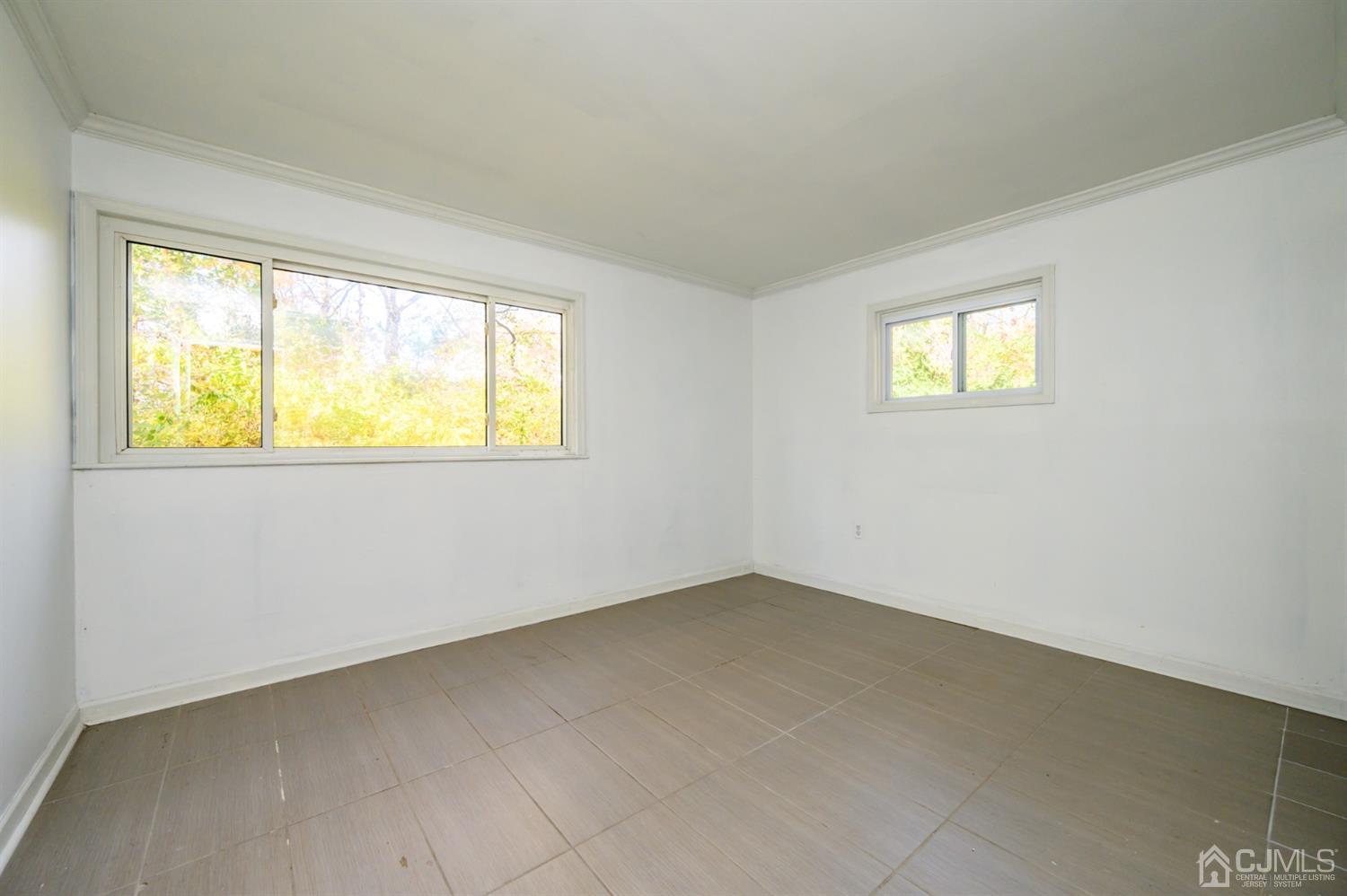 317 Maple Road Mount Laurel, NJ 08054 - Photo 17 of 38 an empty room with windows