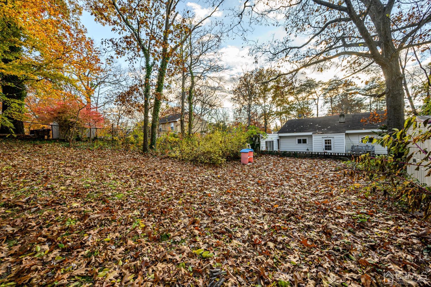 317 Maple Road Mount Laurel, NJ 08054 - Photo 29 of 38 a backyard of a house with lots of green space