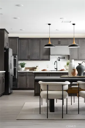 a kitchen with a cabinets and appliances