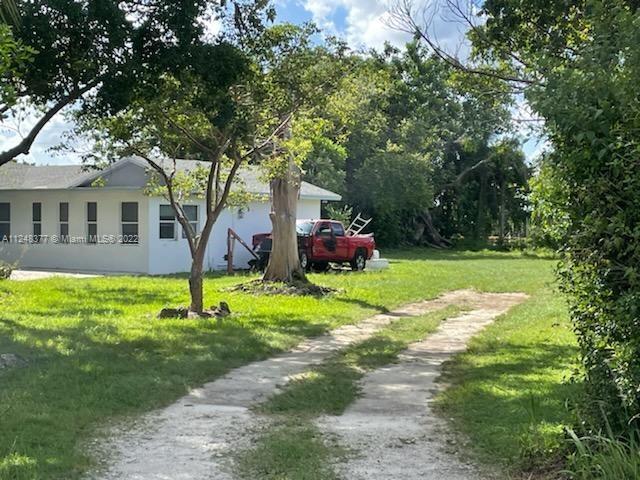 17200 Southwest 208th Street Miami, FL 33187 - Photo 15 of 16 side entrance