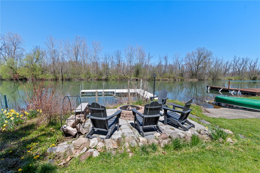 3203 Demont Road Seneca Falls, NY 13148 - Photo 8 of 32 Imagine relaxing at this fire pit area at the wate