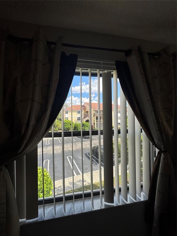 5681 Riverside Drive, Unit 203 Pompano Beach, FL 33067 - Photo 13 of 14 a view of porch