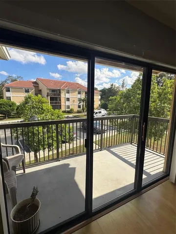a view of a large window with an outdoor view