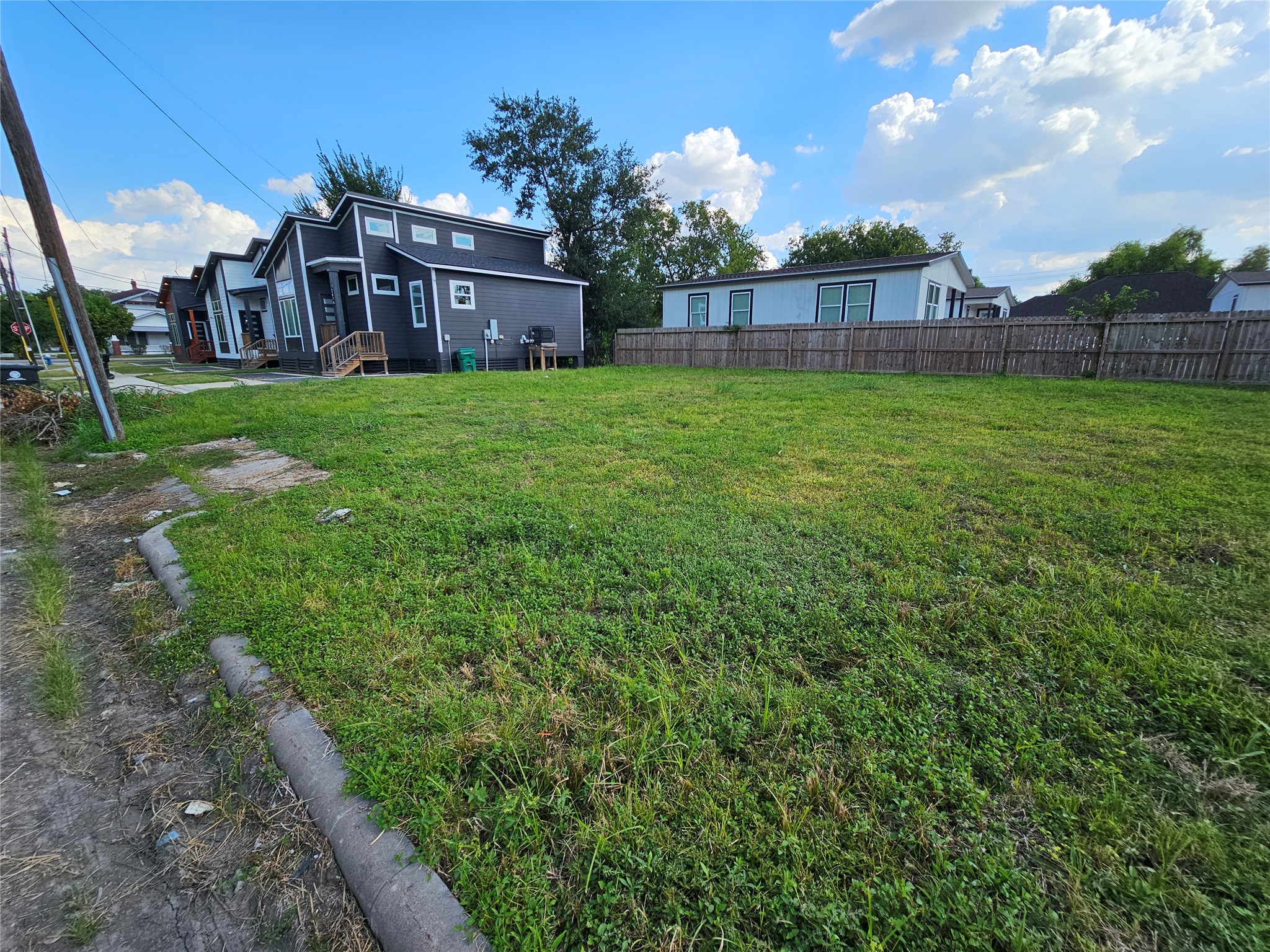 2602 Noble Street Houston, TX 77026 - Photo 6 of 11 a view of a house with a yard and sitting area