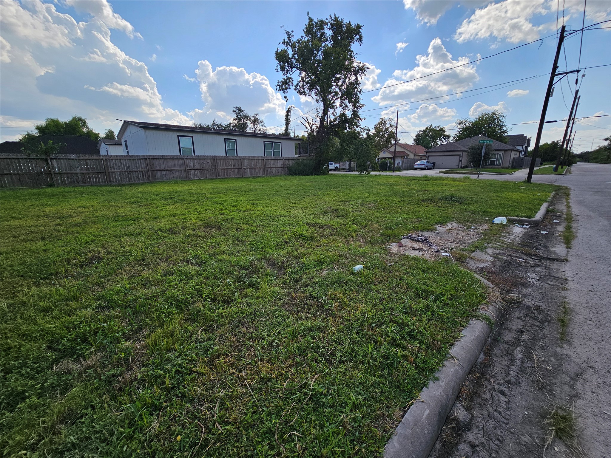 2602 Noble Street Houston, TX 77026 - Photo 8 of 11 a view of a backyard with large trees
