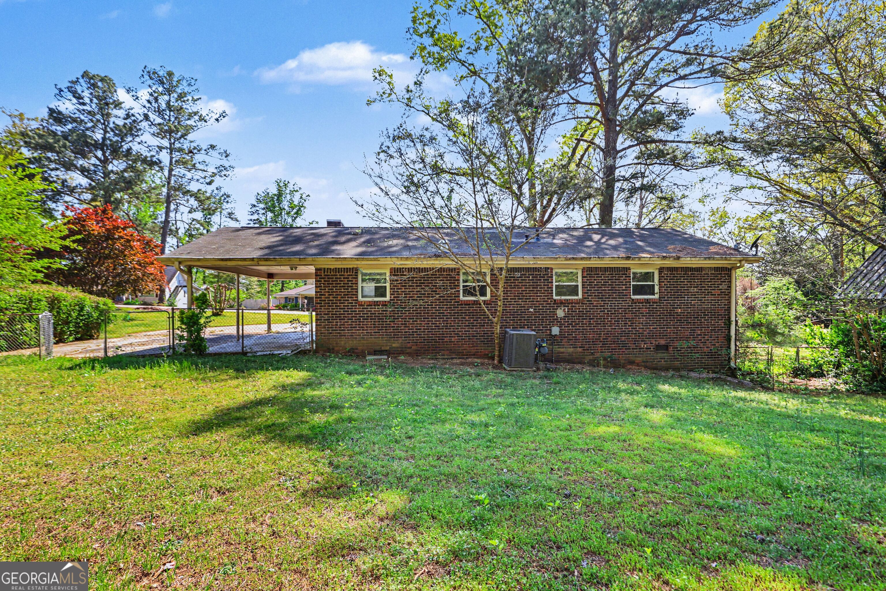 3670 Goodwin Road Austell, GA 30106 - Photo 16 of 16 a view of a house with a garden
