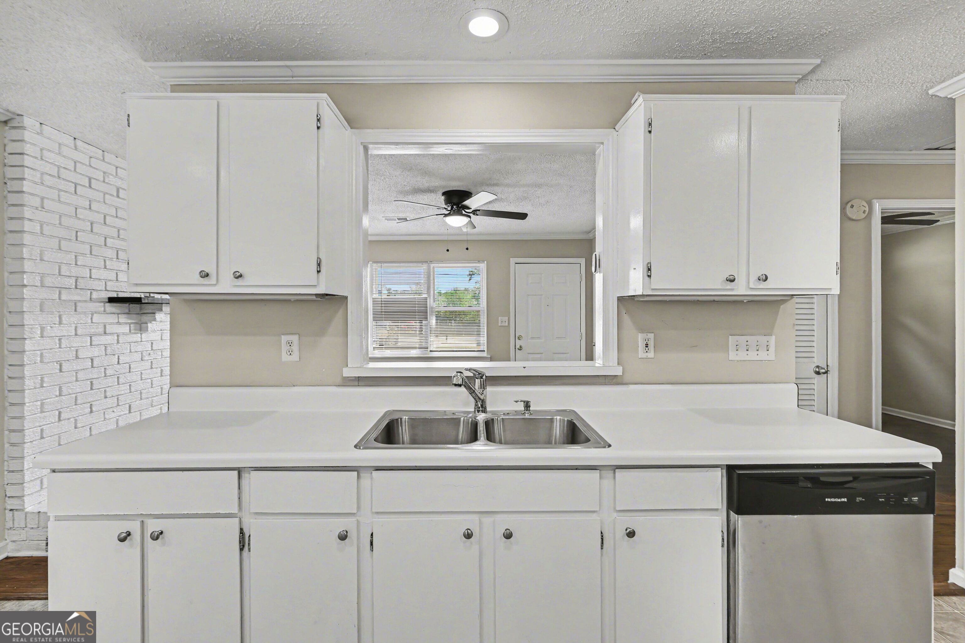 3670 Goodwin Road Austell, GA 30106 - Photo 9 of 16 a kitchen with stainless steel appliances granite countertop a sink and a white cabinets