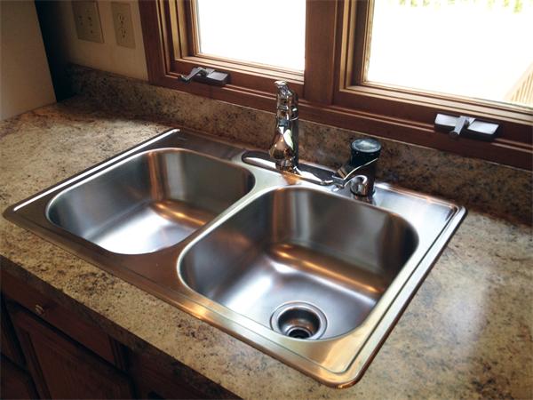 15 McGuire Road Sutton, MA 01590 - Photo 13 of 30 a close view of sink and tap