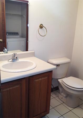15 McGuire Road Sutton, MA 01590 - Photo 16 of 30 a bathroom with a sink toilet and vanity