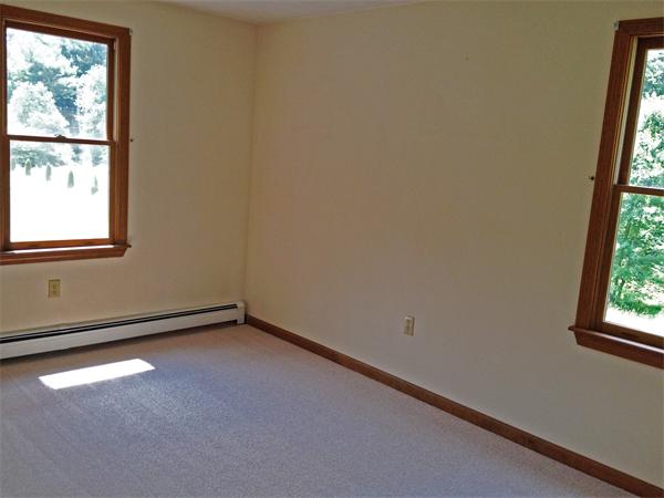 15 McGuire Road Sutton, MA 01590 - Photo 21 of 30 an empty room with a window
