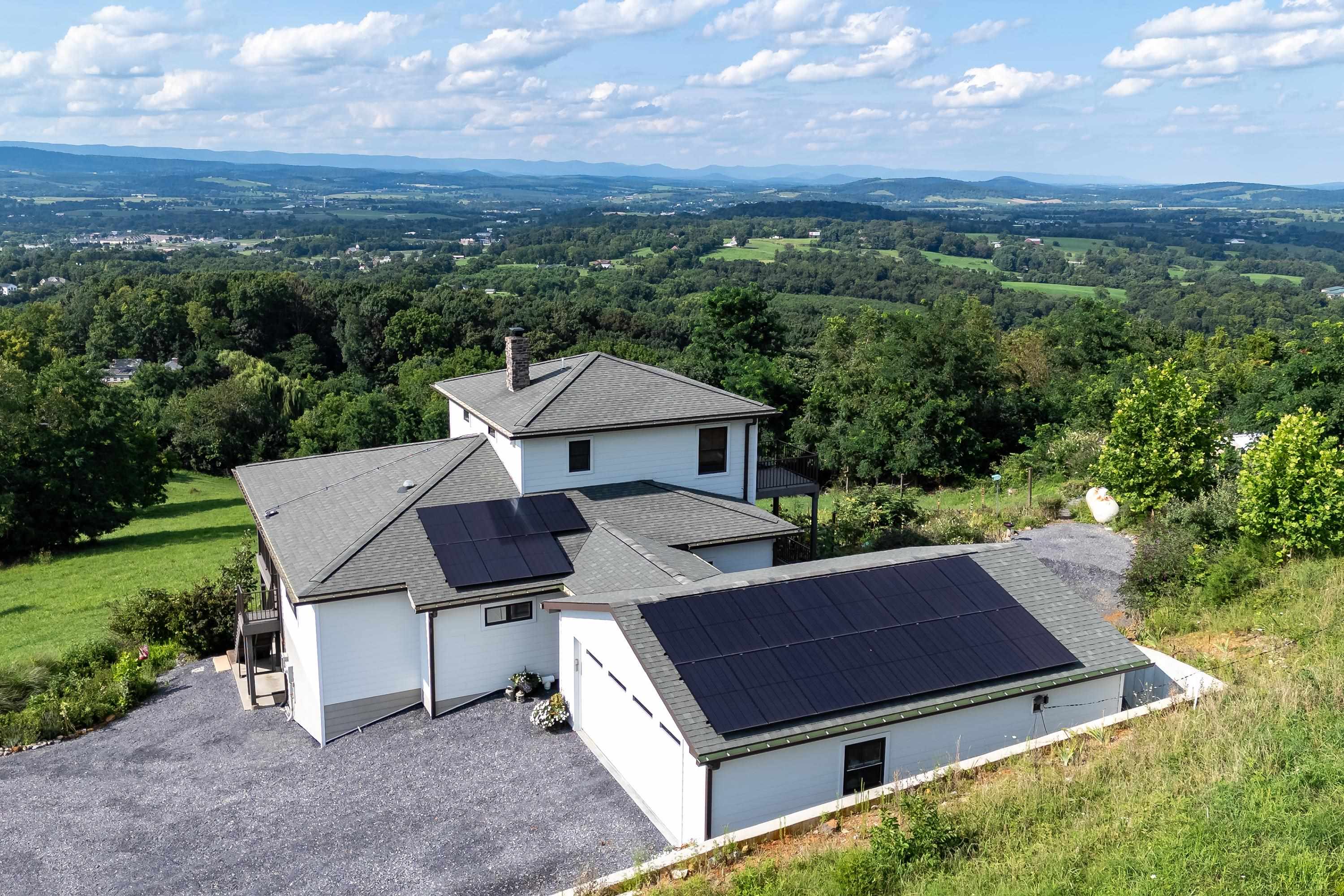 11180 Daphna Road Broadway, VA 22815 - Photo 3 of 75 The aerial view shows off the beauty of the views surrounding the home. From the porch you can view the mountains, valley, and overlook the spacious lot surrounding the home.