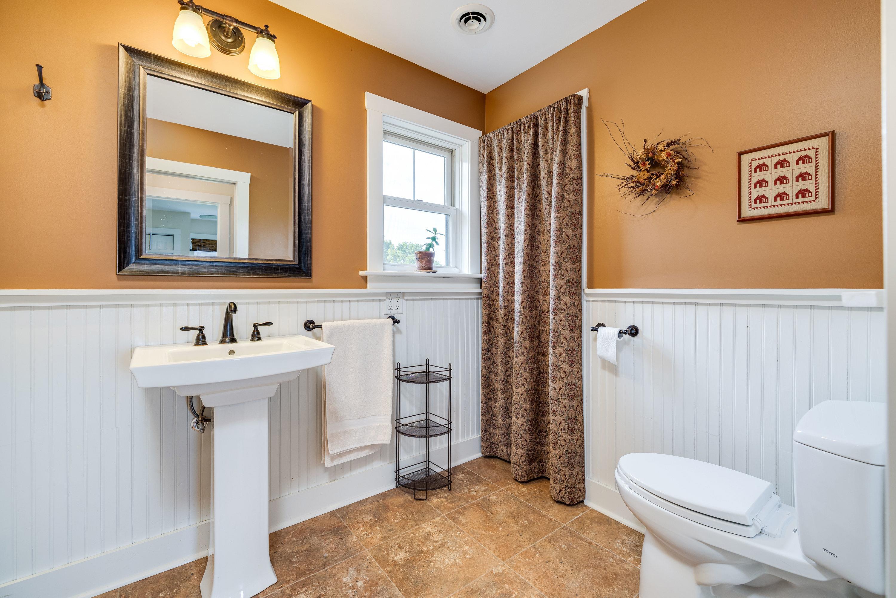 11180 Daphna Road Broadway, VA 22815 - Photo 39 of 75 This full bathroom offers convenience to bedroom 2 and 3. This bathroom features a pedastal sink and features a full bathtub/shower combination.