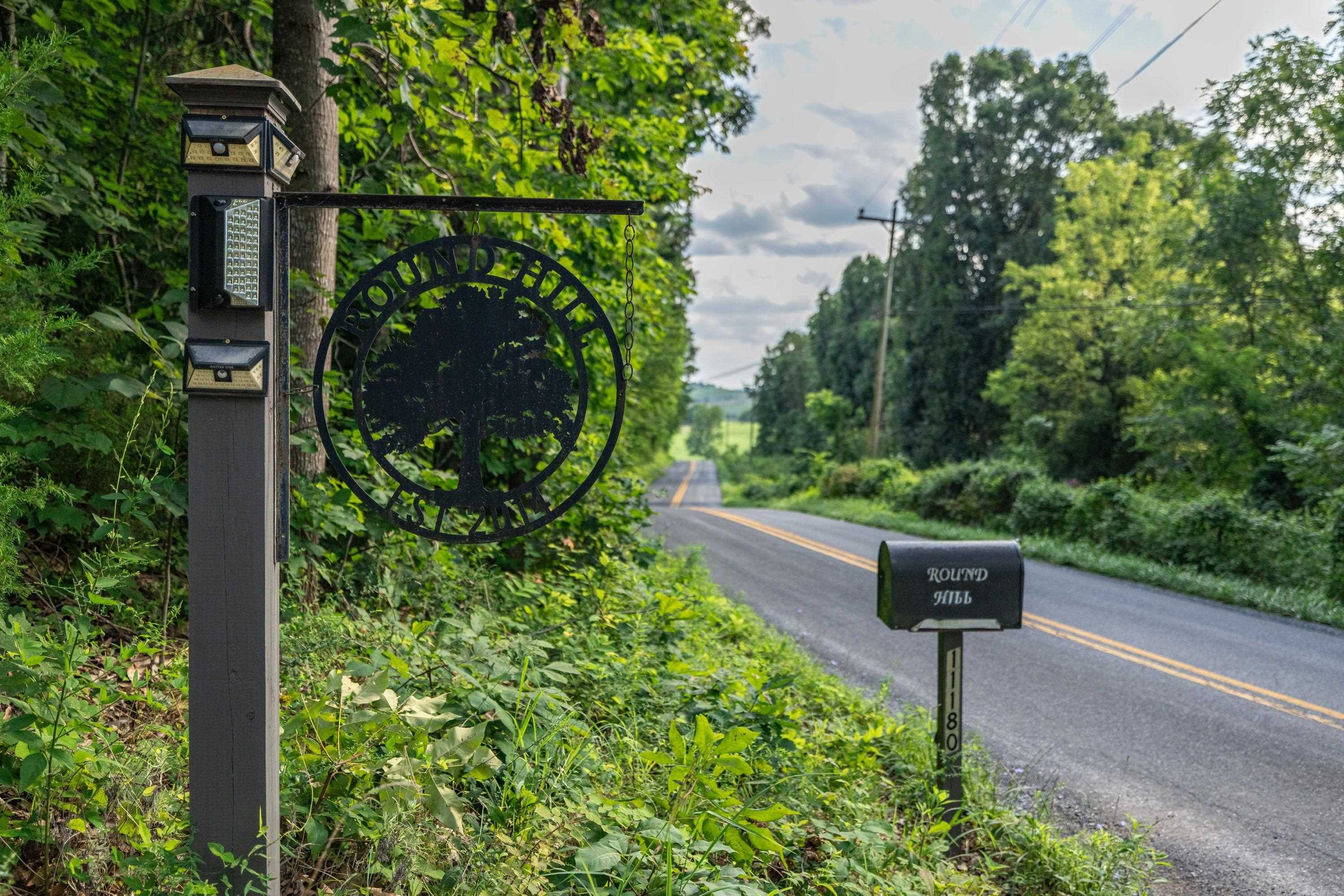 11180 Daphna Road Broadway, VA 22815 - Photo 56 of 75 The gravel driveway offers wooded views for a portion of the drive. This driveway offers lots of privacy.