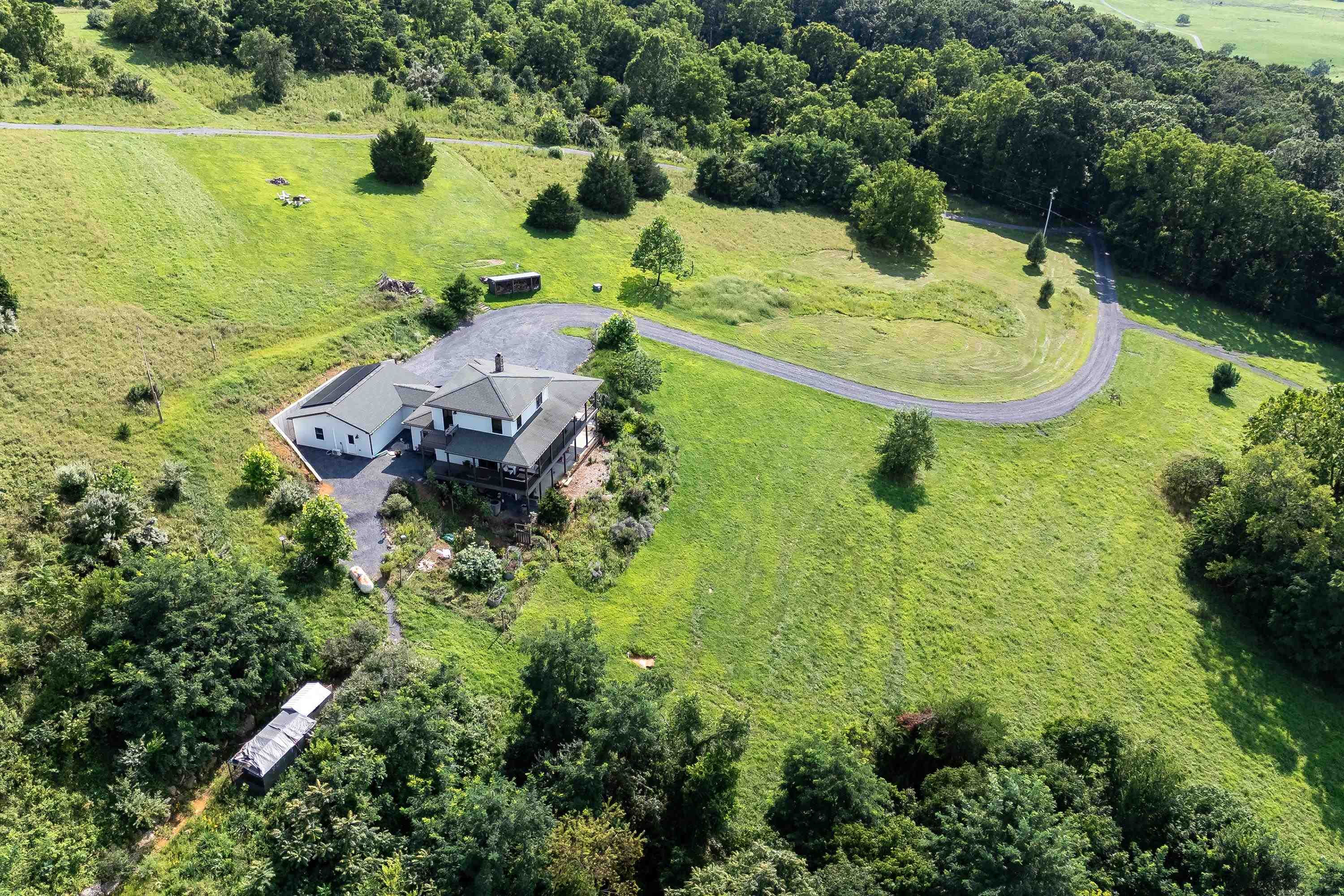 11180 Daphna Road Broadway, VA 22815 - Photo 60 of 75 The aerial view shows off the beauty of the views surrounding the home. From the porch you can view the mountains, valley, and overlook the spacious lot surrounding the home.