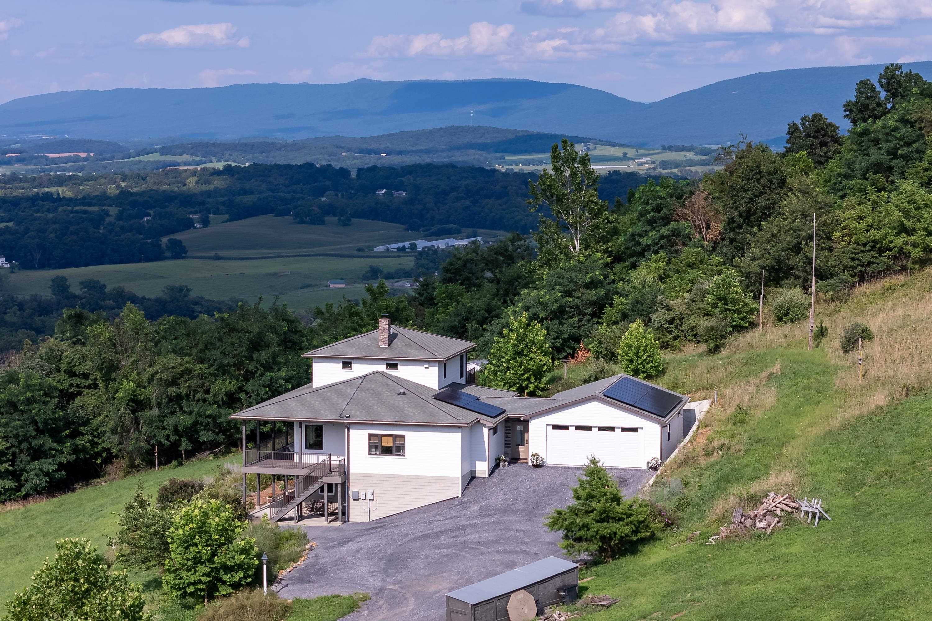 11180 Daphna Road Broadway, VA 22815 - Photo 71 of 75 The aerial view shows off the beauty of the views surrounding the home. From the porch you can view the mountains, valley, and overlook the spacious lot surrounding the home.