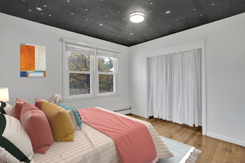 20 Pomeroy Meadow Road Easthampton, MA 01027 - Photo 15 of 42 a bed sitting in a spacious bedroom next to a window
