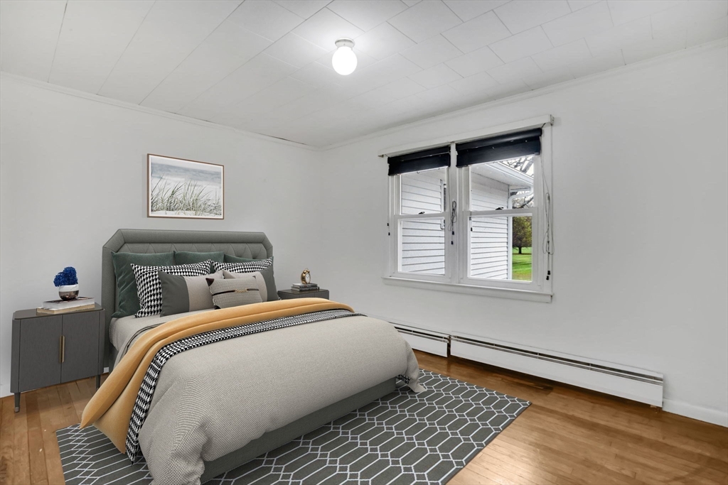 20 Pomeroy Meadow Road Easthampton, MA 01027 - Photo 17 of 42 a bedroom with a bed and a window