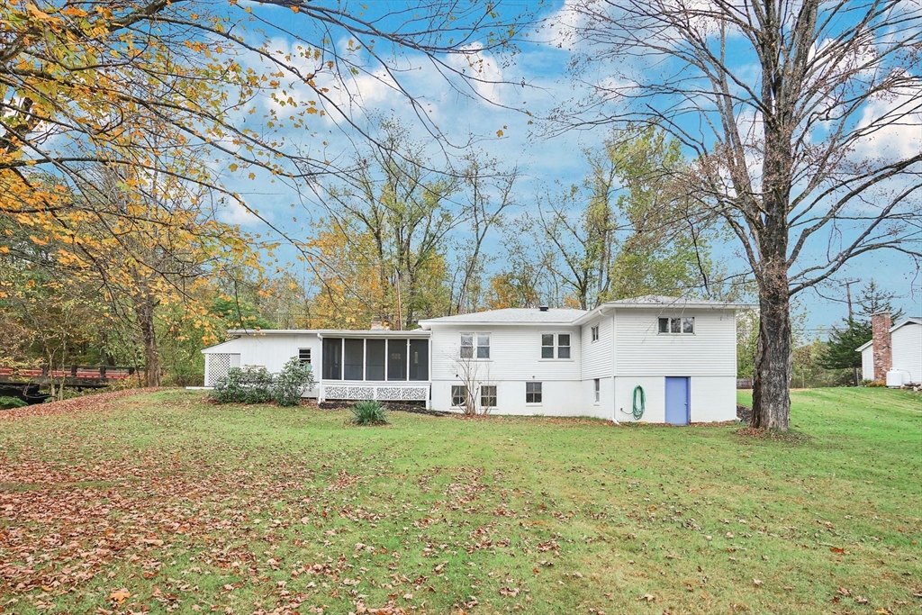 20 Pomeroy Meadow Road Easthampton, MA 01027 - Photo 2 of 42 a view of a house with a yard and sitting area