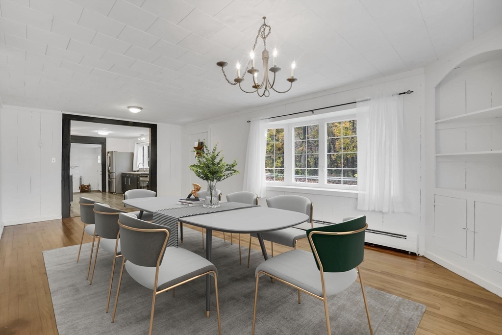 20 Pomeroy Meadow Road Easthampton, MA 01027 - Photo 21 of 42 a view of a dining room with furniture window and wooden floor