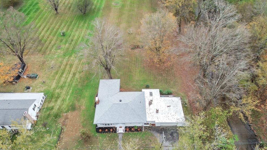 20 Pomeroy Meadow Road Easthampton, MA 01027 - Photo 34 of 42 an aerial view of a house with a yard