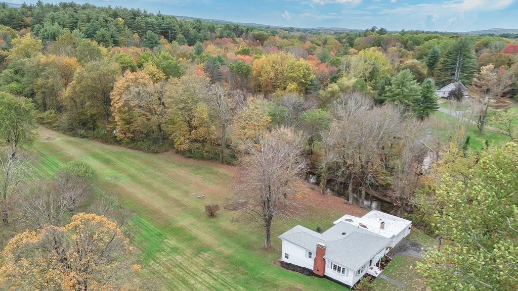 20 Pomeroy Meadow Road Easthampton, MA 01027 - Photo 36 of 42 an aerial view of a house with a yard