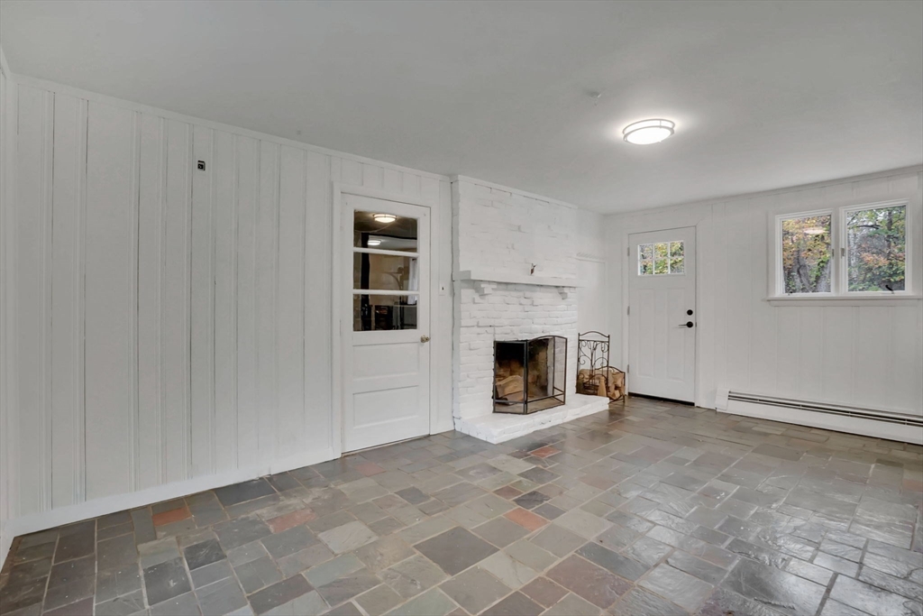 20 Pomeroy Meadow Road Easthampton, MA 01027 - Photo 8 of 42 a view of a livingroom with a fireplace