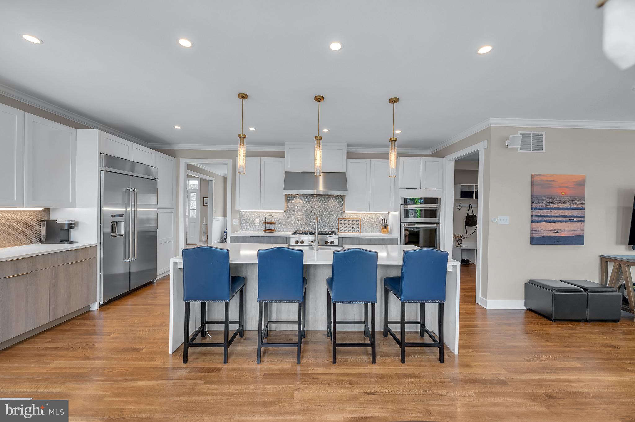 421 Howard Road Gladwyne, PA 19035 - Photo 12 of 49 a large kitchen with a table and chairs