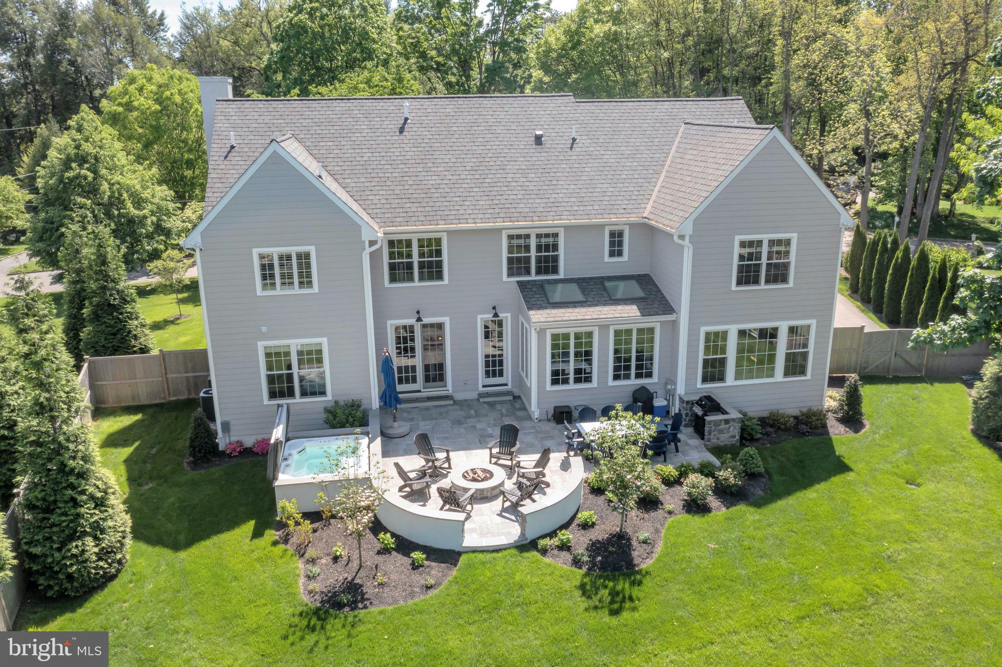 421 Howard Road Gladwyne, PA 19035 - Photo 2 of 49 a aerial view of a house with swimming pool and garden