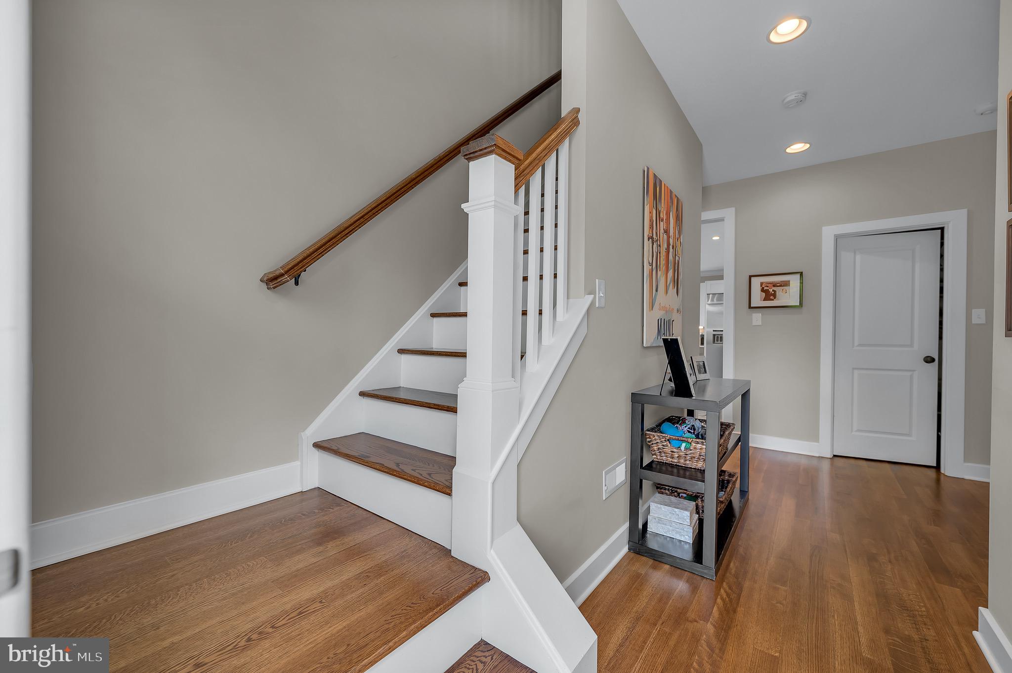 421 Howard Road Gladwyne, PA 19035 - Photo 23 of 49 a view of entryway with wooden floor and stairs