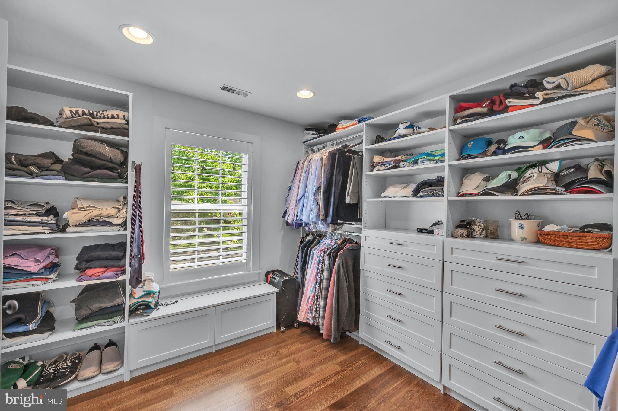 421 Howard Road Gladwyne, PA 19035 - Photo 30 of 49 a view of walk in closet with clothes and shoes