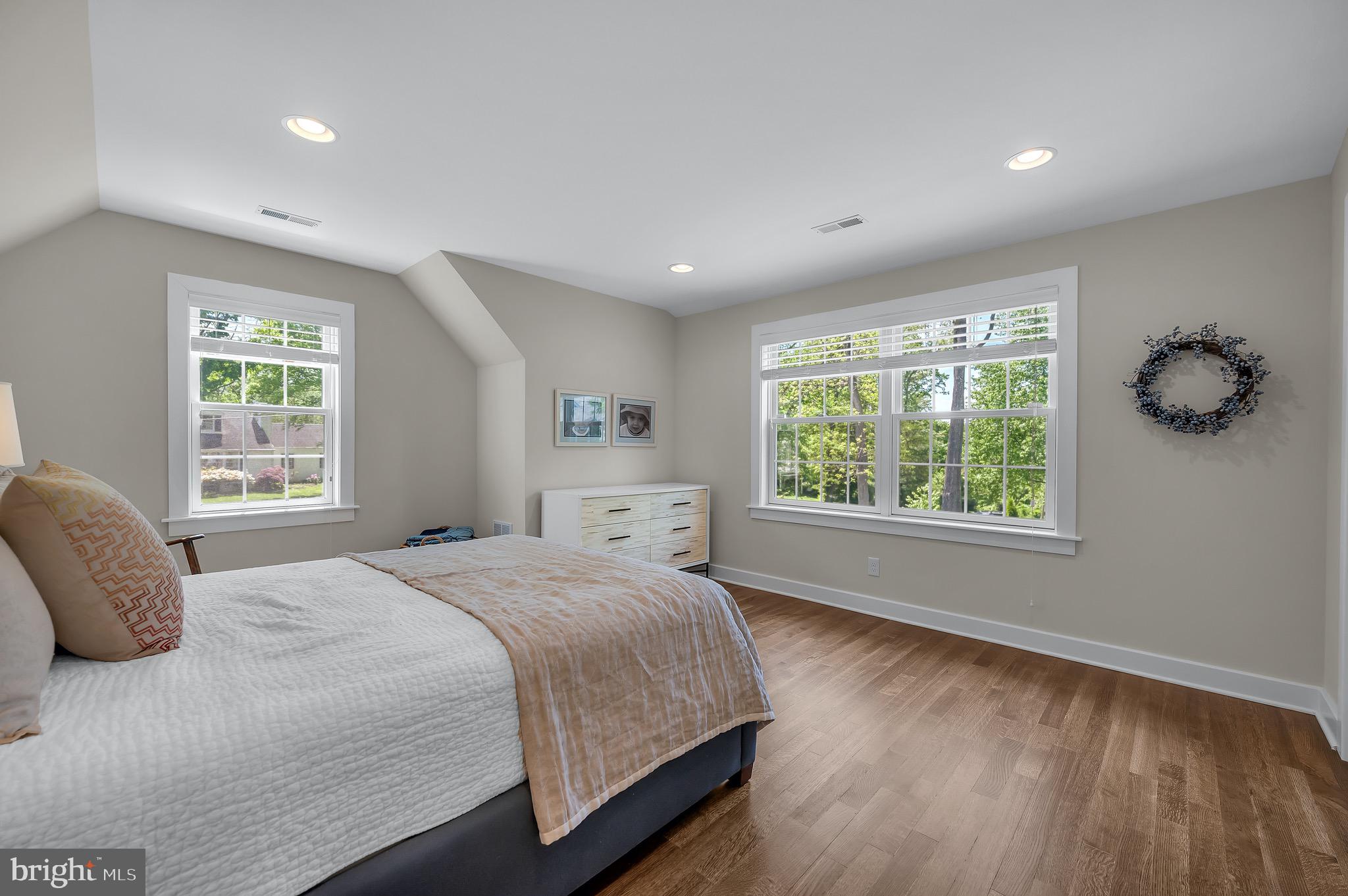 421 Howard Road Gladwyne, PA 19035 - Photo 33 of 49 a bedroom with a large bed and a window