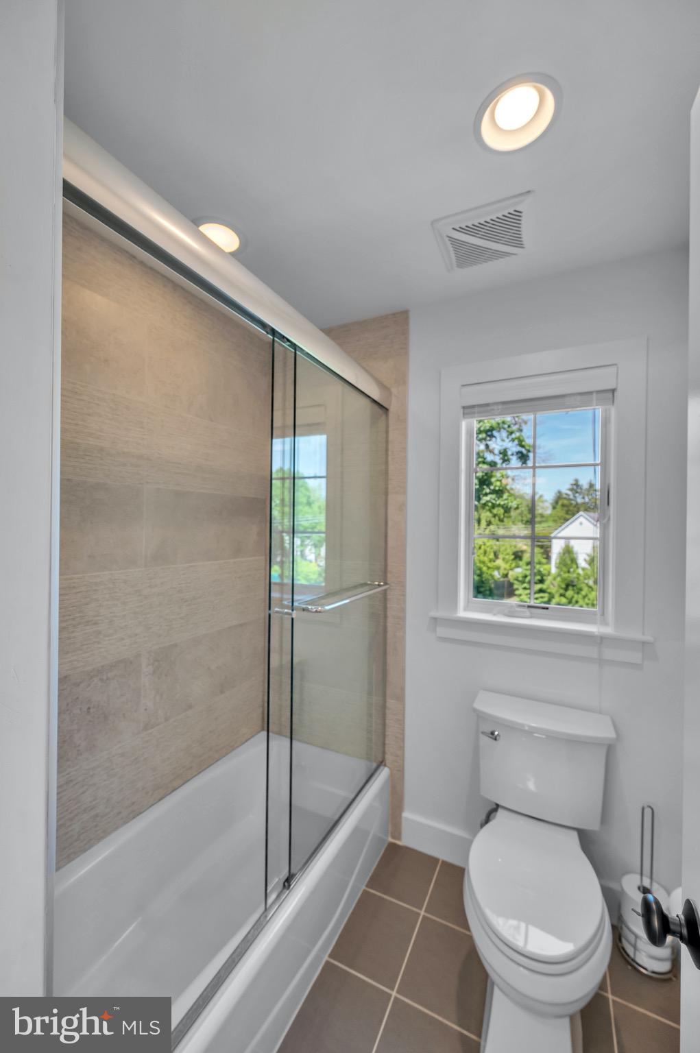 421 Howard Road Gladwyne, PA 19035 - Photo 37 of 49 a bathroom with a toilet and a shower