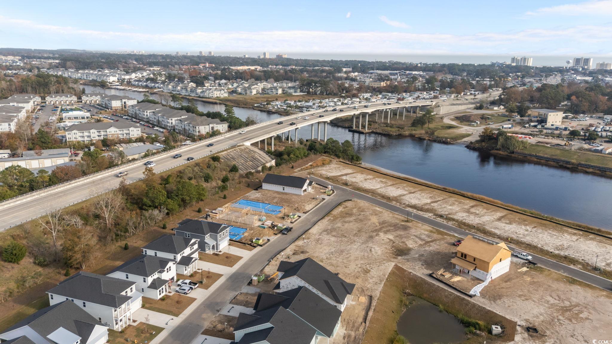 787 Ebb Tide Road Little River, SC 29566 - Photo 4 of 32 View of property location featuring a nearby body of water and a notable bridge