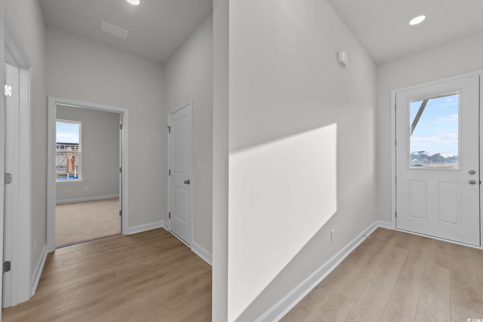 787 Ebb Tide Road Little River, SC 29566 - Photo 7 of 32 Foyer featuring light wood finished floors, healthy amount of natural light, and recessed lighting