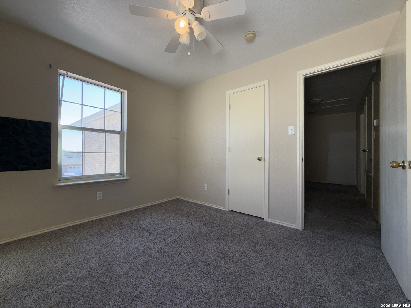 8162 Heights Valley Converse, TX 78109 - Photo 12 of 18 a view of an empty room with a window