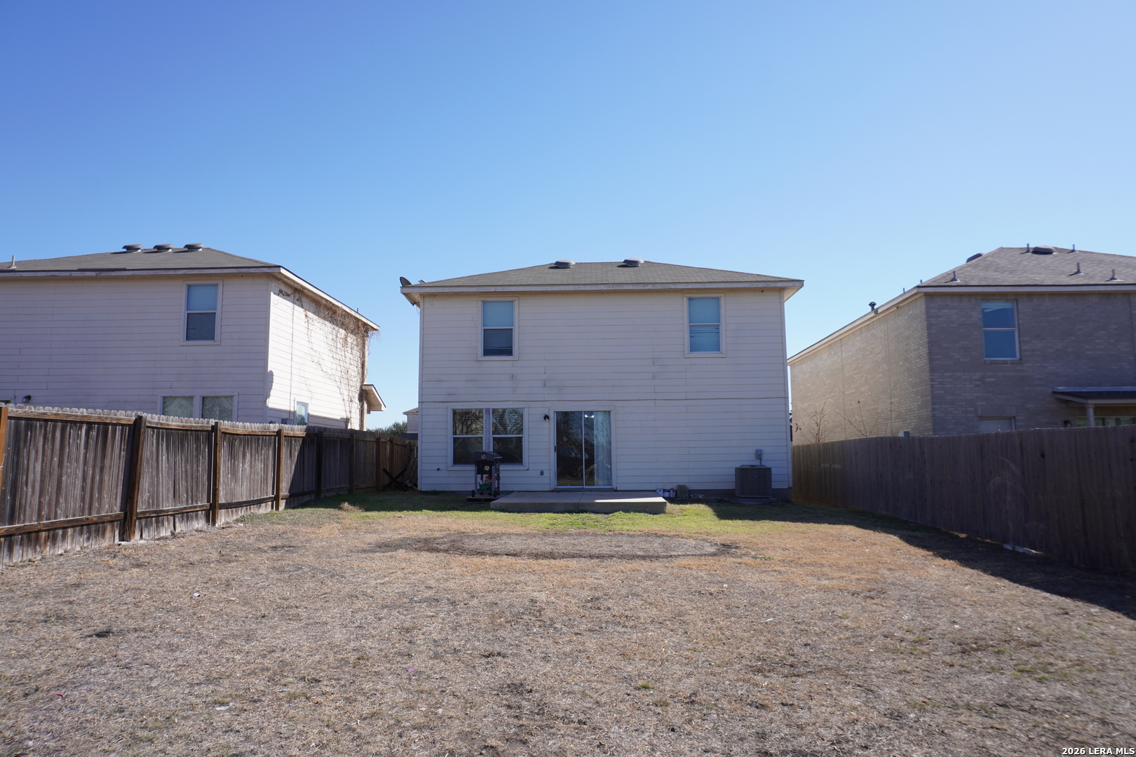 8162 Heights Valley Converse, TX 78109 - Photo 18 of 18 a view of a house with a backyard
