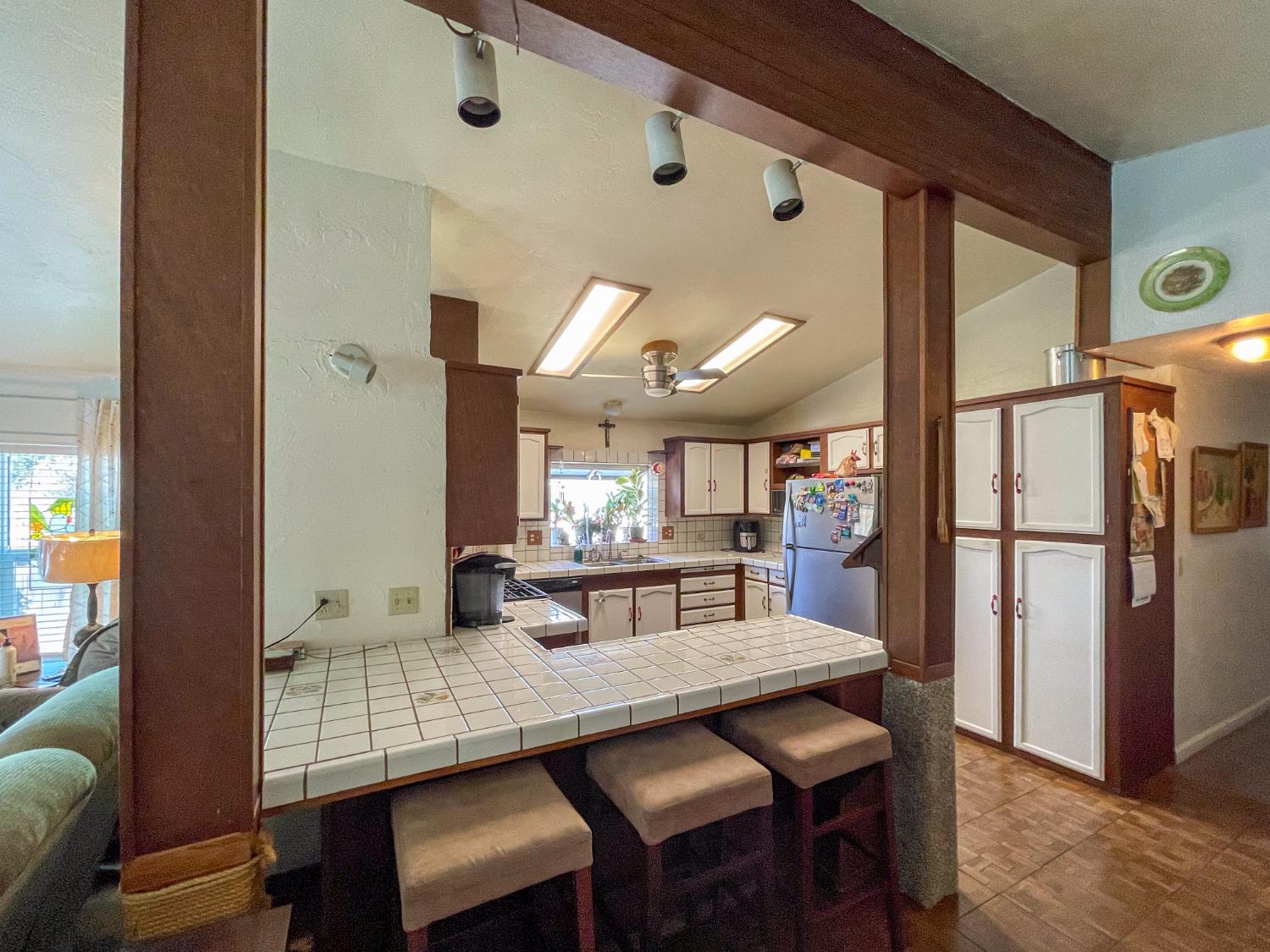 414 F Street Isleton, CA 95641 - Photo 32 of 49 a dining room with furniture and a chandelier