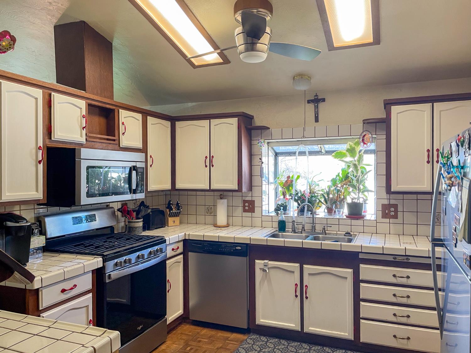 414 F Street Isleton, CA 95641 - Photo 34 of 49 a kitchen with stainless steel appliances granite countertop a stove and a sink