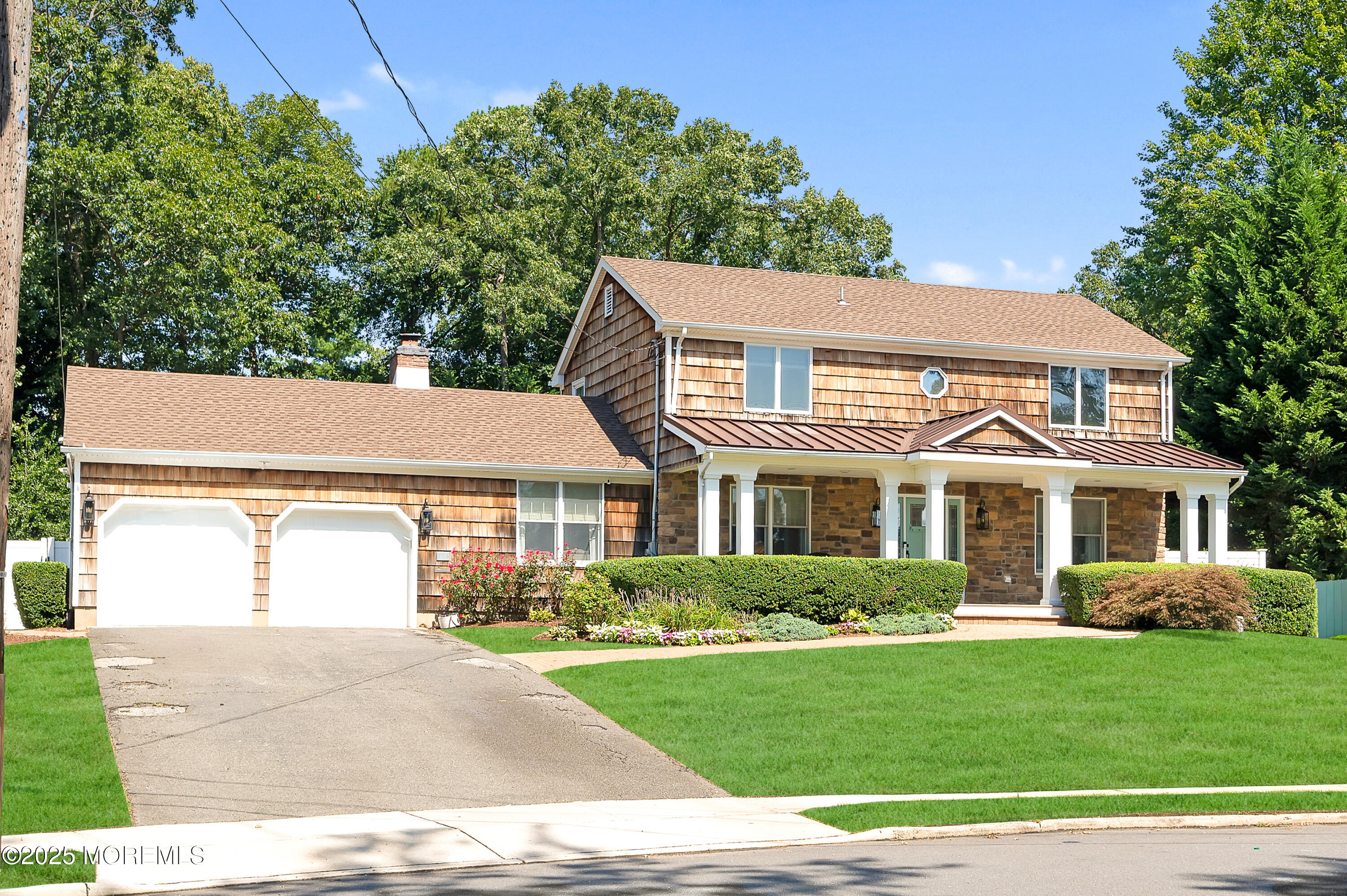 80 Robbins Court Brick, NJ 08724 - Photo 1 of 33 a front view of a house with a garden