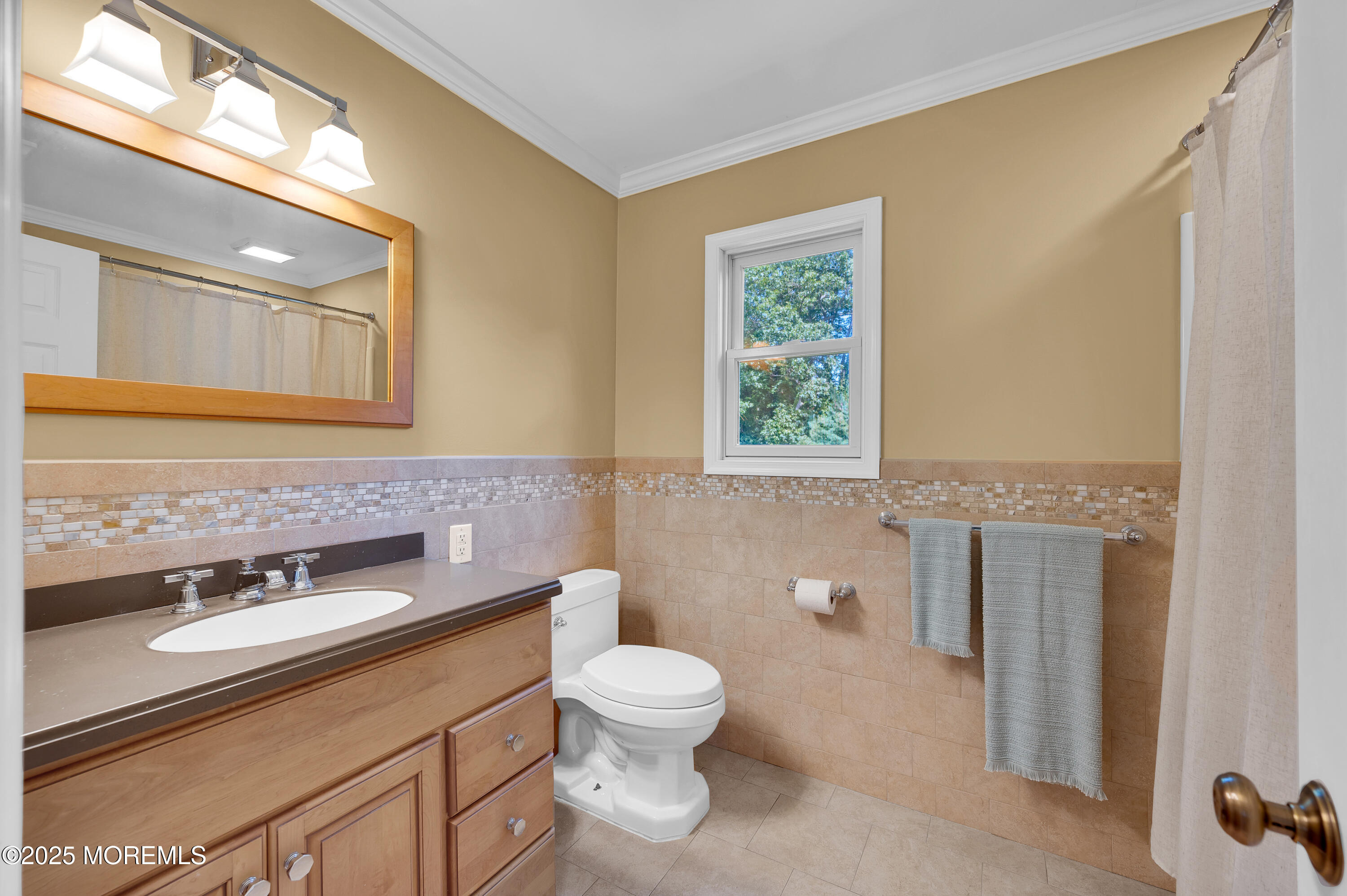80 Robbins Court Brick, NJ 08724 - Photo 23 of 33 a bathroom with a toilet sink and mirror