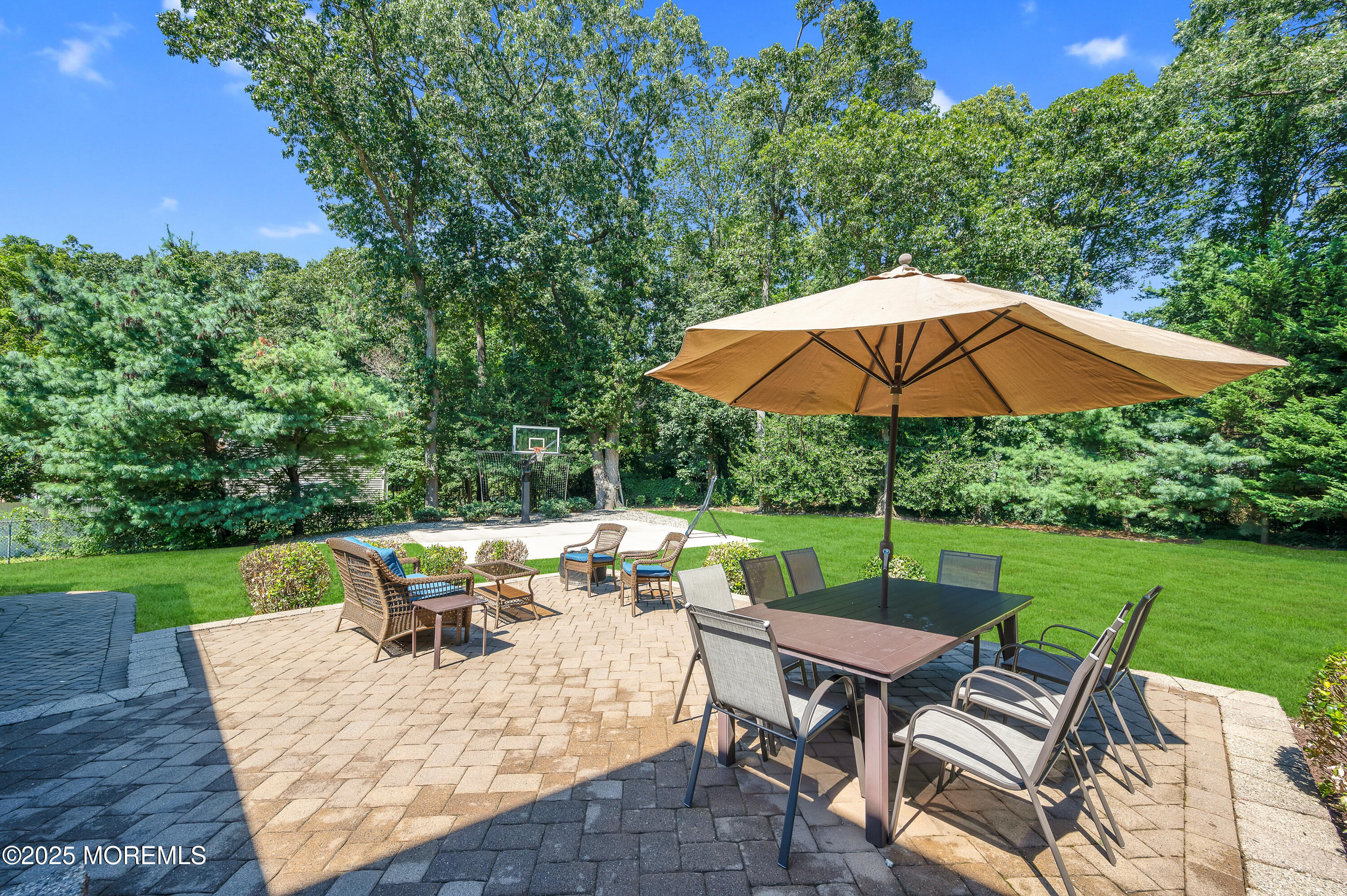 80 Robbins Court Brick, NJ 08724 - Photo 24 of 33 a view of backyard with seating area and green space