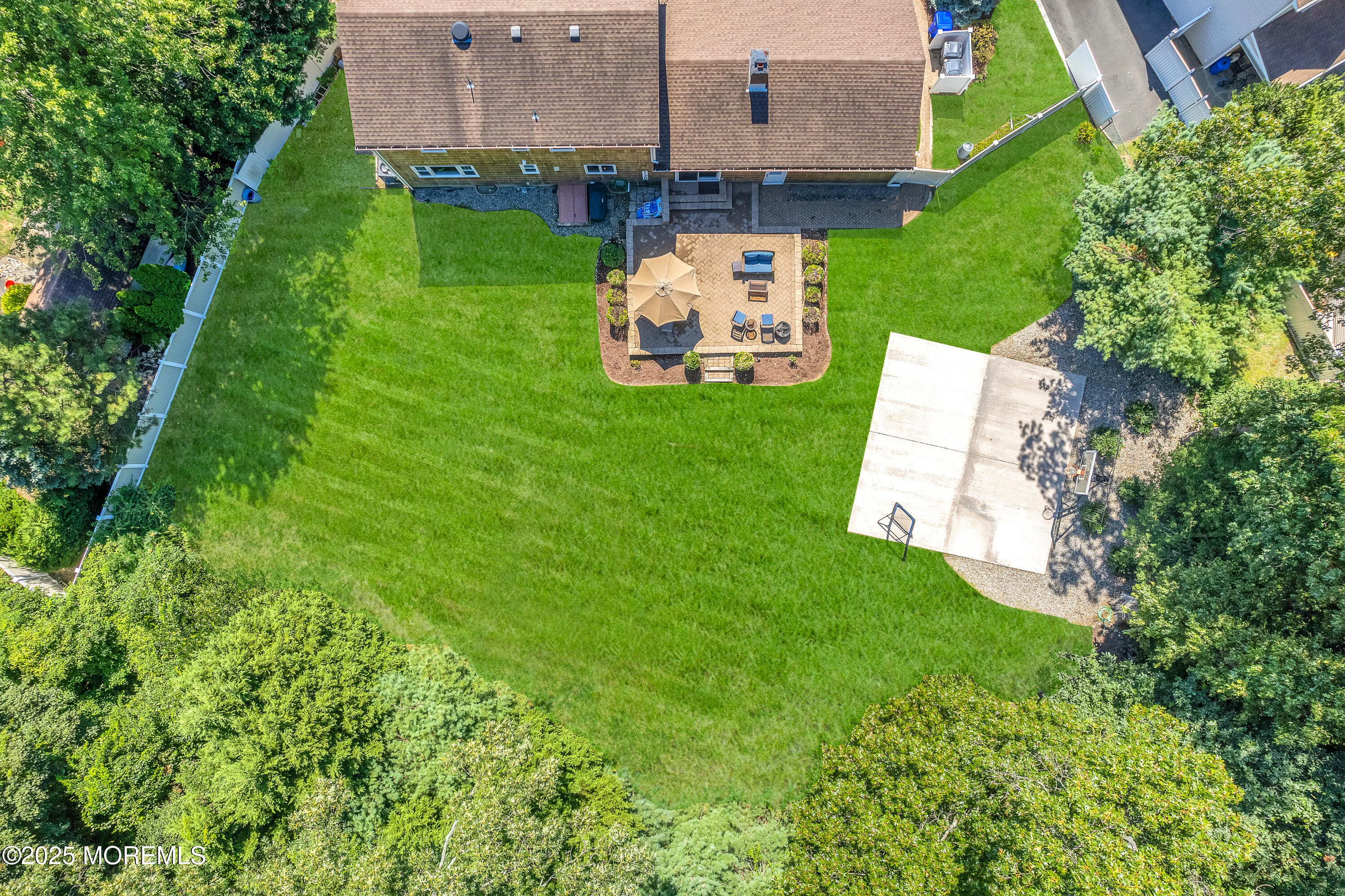 80 Robbins Court Brick, NJ 08724 - Photo 27 of 33 an aerial view of a house with backyard space and garden