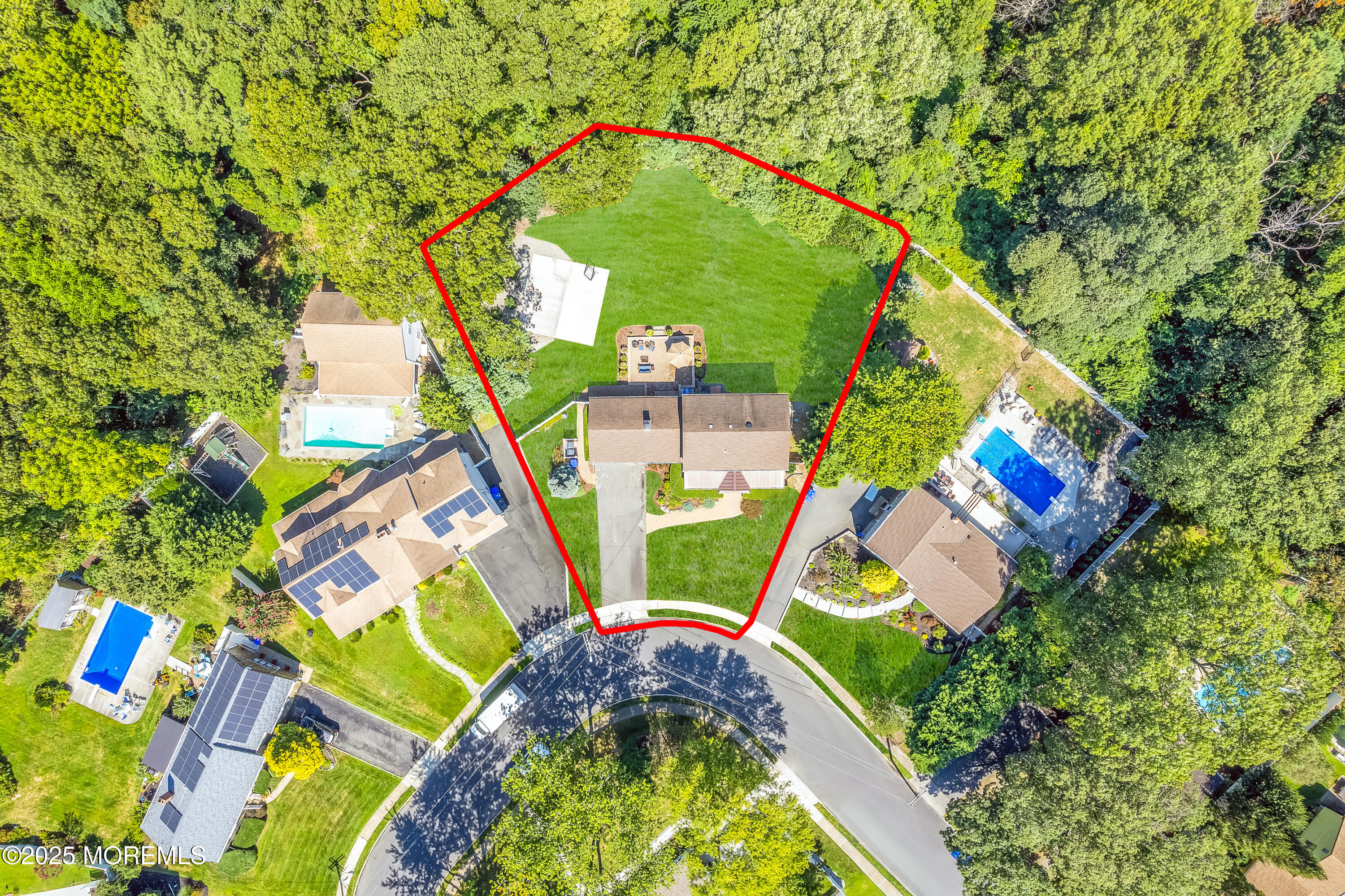 80 Robbins Court Brick, NJ 08724 - Photo 29 of 33 an aerial view of a house with a yard and potted plants