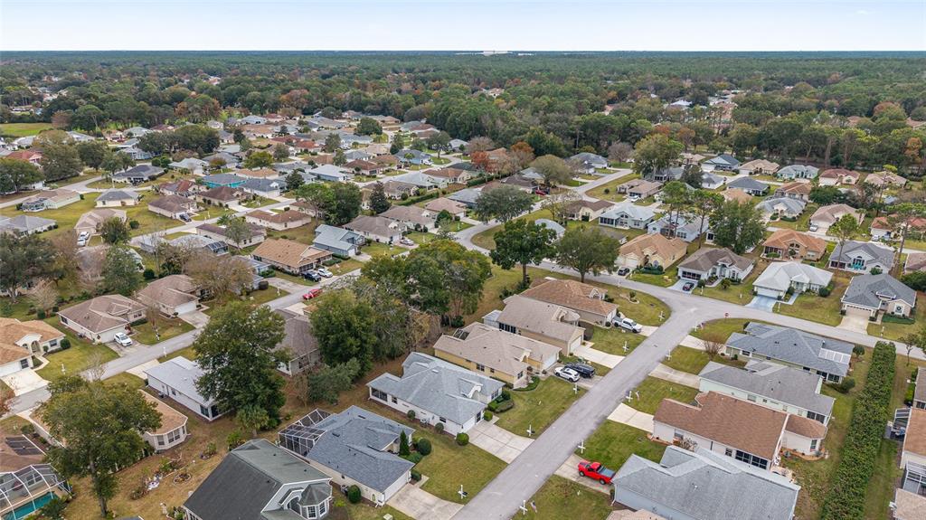 11233 Southwest 73rd Circle Ocala, FL 34476 - Photo 51 of 53 an aerial view of a city with lots of residential buildings