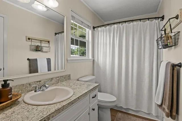 a view of a patio with a table chairs and a patio