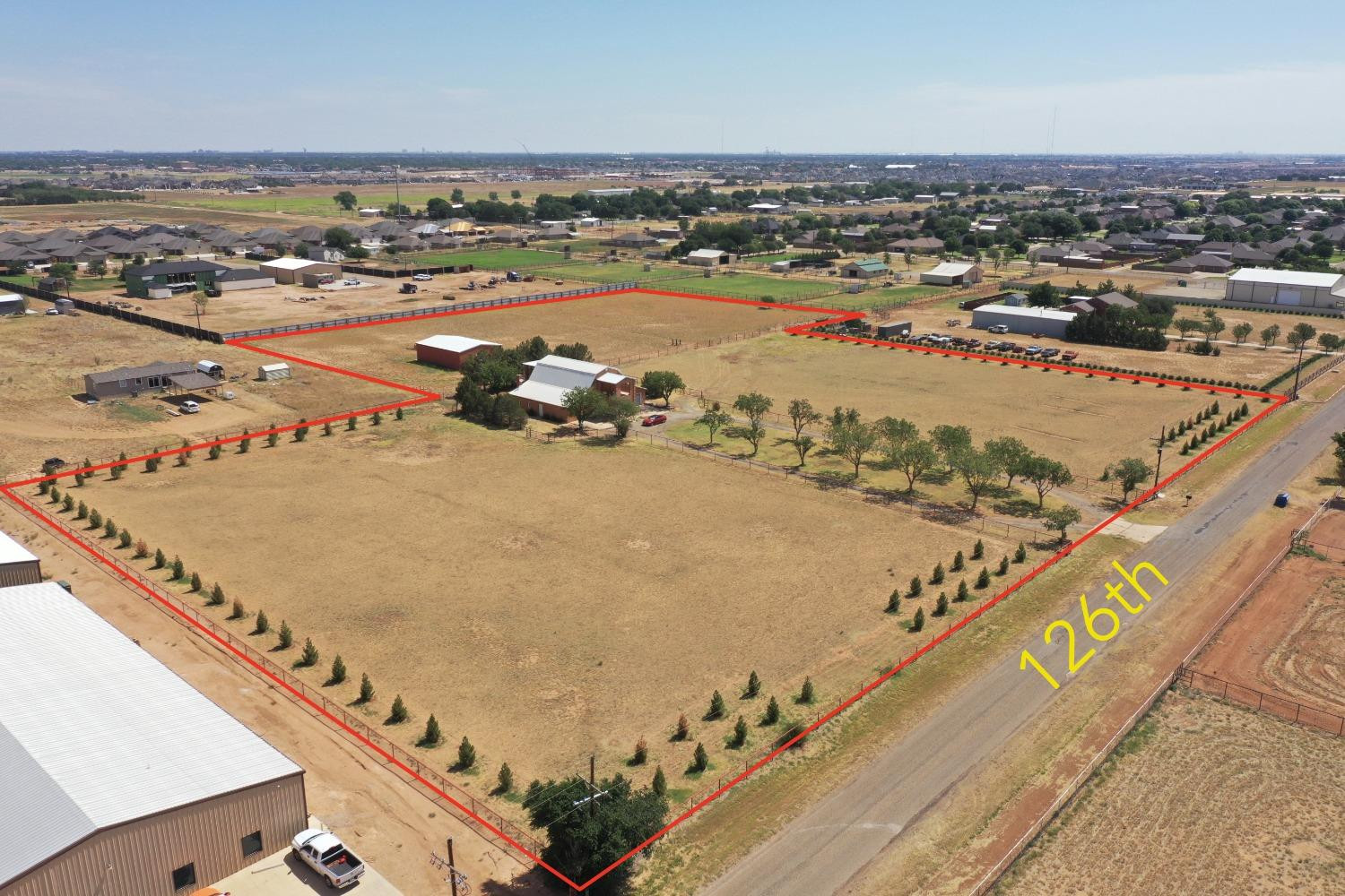 5520 126th Street Lubbock, TX 79424 - Photo 3 of 9 an aerial view of a city