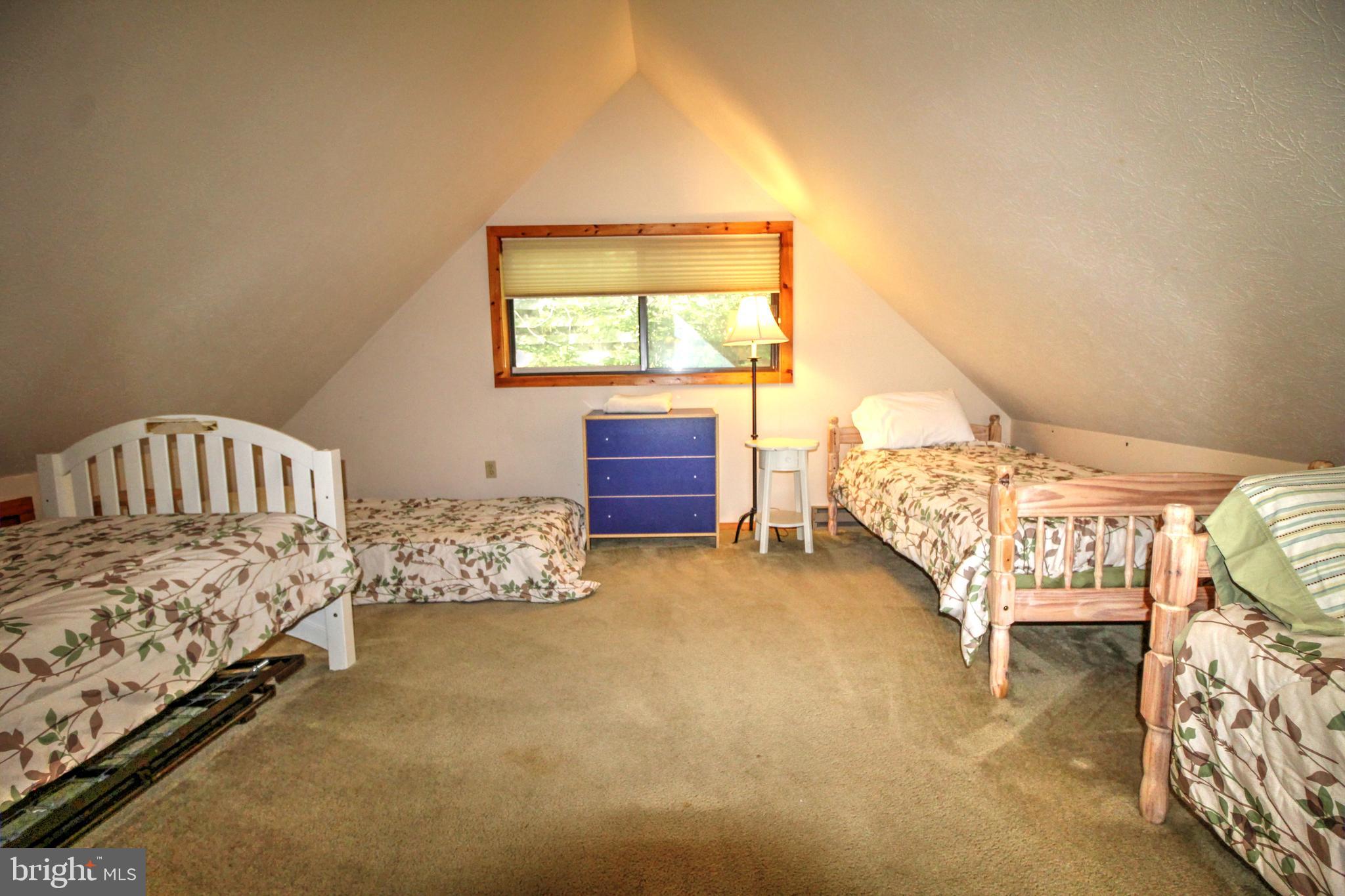 198 Hood's Point Road Basye, VA 22810 - Photo 12 of 23 a bed room with a bed and a window